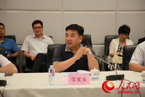 国家旅游局信息中心副主任信宏业 人民网崔璐 摄